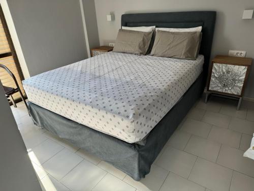 Ένα ή περισσότερα κρεβάτια σε δωμάτιο στο Sofia Rooms