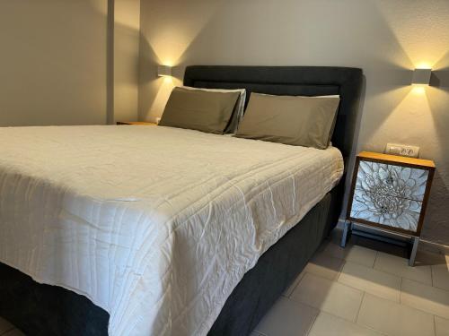 Ένα ή περισσότερα κρεβάτια σε δωμάτιο στο Sofia Rooms