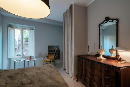 Ένα ή περισσότερα κρεβάτια σε δωμάτιο στο My Hideaway - Laglio