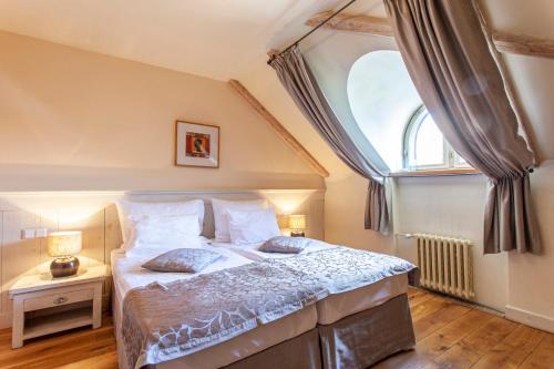 Postel nebo postele na pokoji v ubytování Boutique Hotel Nautilus