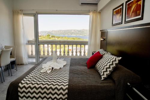 Postel nebo postele na pokoji v ubytování Villa La Font Apart Hotel & Spa