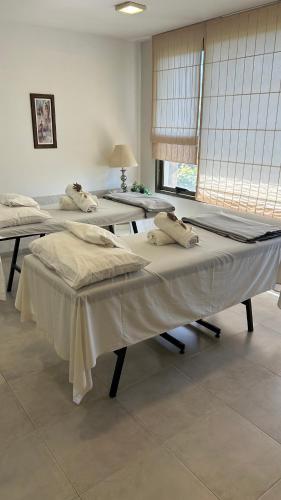 Postel nebo postele na pokoji v ubytování Villa La Font Apart Hotel & Spa