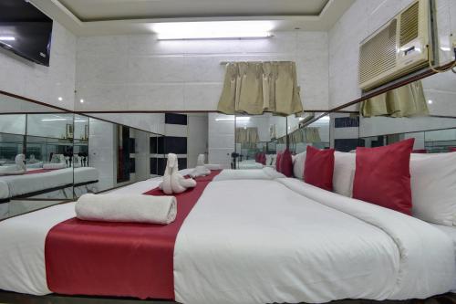 Postel nebo postele na pokoji v ubytování Sun Guest House