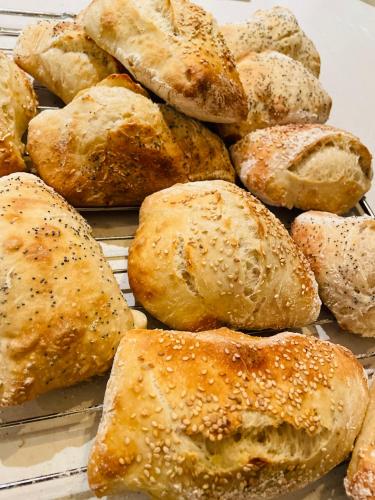 a bunch of rolls sitting on a cooling rack at Hankø Hotell & Spa in Gressvik