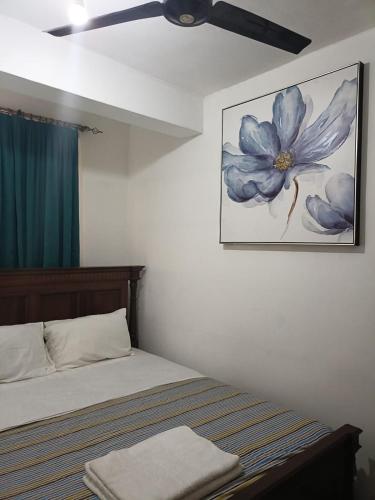 Giường trong phòng chung tại Calitwapa Studios Mtwapa