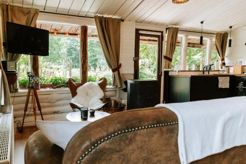 Posezení v ubytování Le chalet Sud