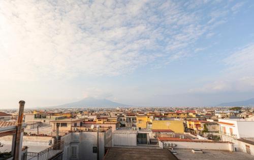 a view of a city from the roof of a building at Room Capri in SantʼAntonio Abate