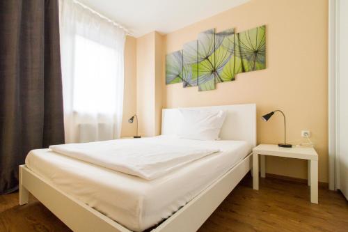 Posteľ alebo postele v izbe v ubytovaní Residenz Donaucity
