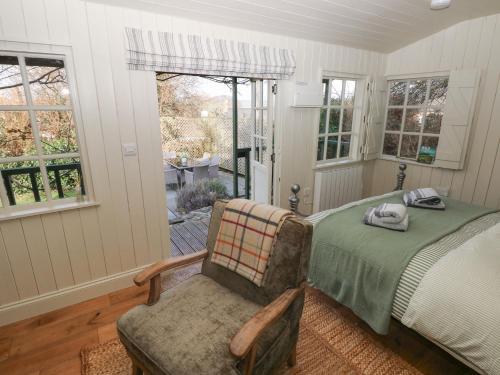 En eller flere senge i et værelse på Millfield