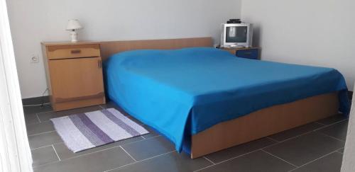 Postel nebo postele na pokoji v ubytování Apartments Bruna