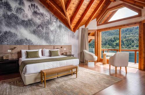 Postel nebo postele na pokoji v ubytování Puerto Manzano Boutique Hotel