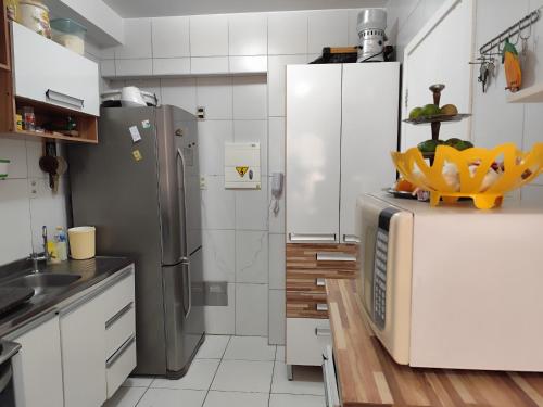 Køkken eller tekøkken på Apartamento Dois Quartos - Garagem - Localização excelente em Brotas