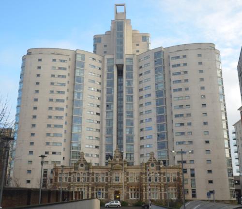 a large white building with a church in front of it at Large Double Room in Cardiff City Centre, Room Only with Own Bathroom, HOST LIVES ON SITE in Cardiff