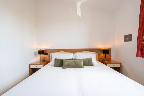 Postel nebo postele na pokoji v ubytování Hotel Le Corti