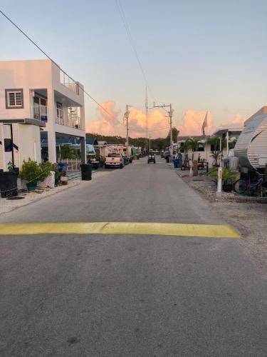 an empty street with a yellow line in the middle at Keys Paradise! in Key Largo