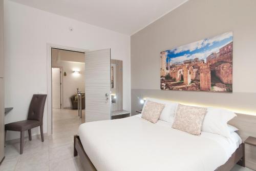 A bed or beds in a room at B&B Kalurya - Lecce Selection
