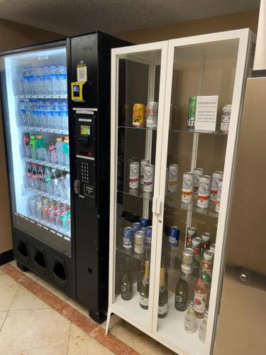 a refrigerator filled with lots of bottles of water at Quality Inn & Suites Seabrook- NASA- Kemah in Seabrook