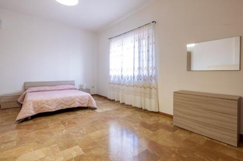 Ένα ή περισσότερα κρεβάτια σε δωμάτιο στο Casa Cantoro