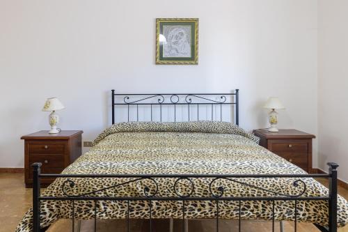 Ένα ή περισσότερα κρεβάτια σε δωμάτιο στο Casa Cantoro