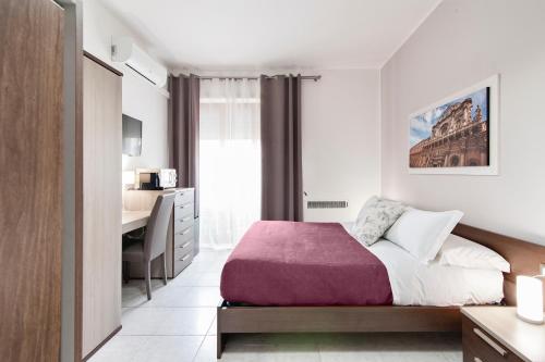 Ein Bett oder Betten in einem Zimmer der Unterkunft B&B Kalurya - Lecce Selection
