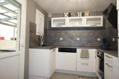 Kuchyň nebo kuchyňský kout v ubytování maison 4 hôtes