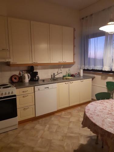 Dapur atau dapur kecil di Apartementos Tohmajärvi