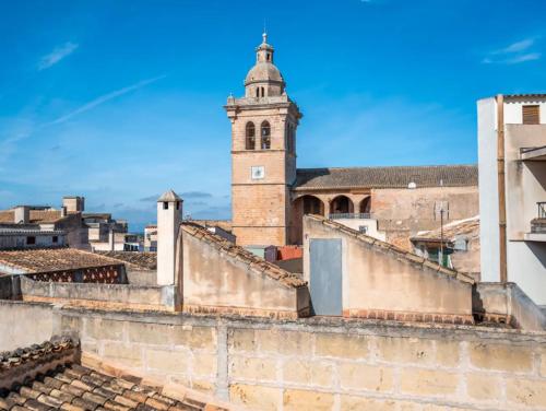 a view from the roof of a building with a tower at Cas Mercader in Algaida