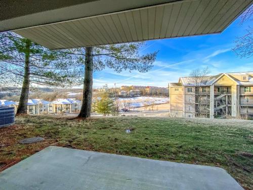 a view from the porch of a apartment building at Branson Condo on Thousand Hills Golf Course with Indoor Pool and Hot Tub in Branson