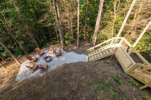 an overhead view of a patio with chairs and a bridge at Dreamscape in Rogers