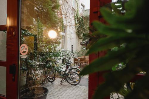 a group of bikes parked next to a building at Wombat's City Hostel Leipzig in Leipzig