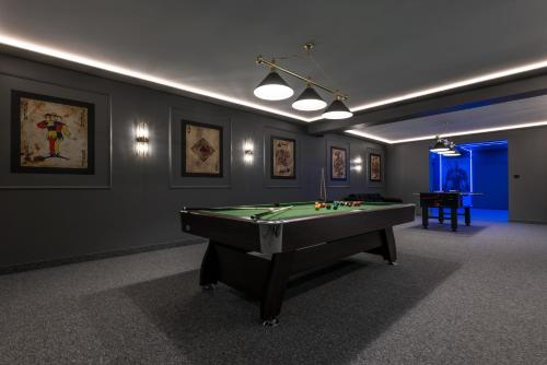 a billiard room with a pool table in it at Pensjonat Jasny Brzeg in Władysławowo