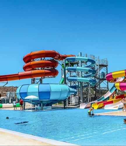 a water park with a water slide and slides at The Best Apartment on the beach 'Caesar Beach' Bogaz, North Cyprus in Boğaz