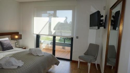 Ένα ή περισσότερα κρεβάτια σε δωμάτιο στο Luxury 3 Bedroom, 3 ensuits, Private pool, Vale do Lobo