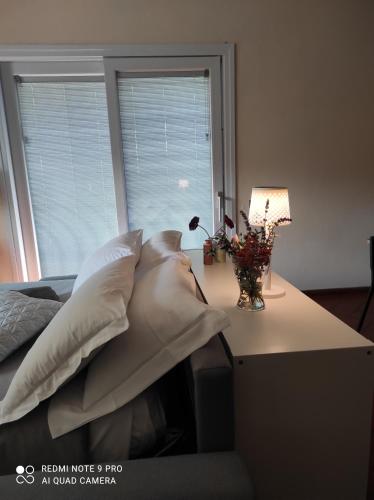 Ένα ή περισσότερα κρεβάτια σε δωμάτιο στο Bed and Breakfast CASA MANU
