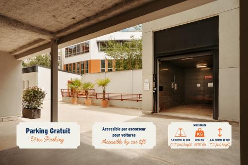 un ingresso a un edificio con cartelli di fronte ad esso di Edgar Suites Montrouge a Montrouge