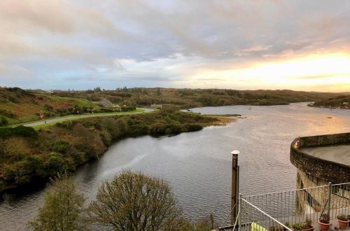 a view of a river from a bridge at White Heather 3 Bed Clifden Town in Clifden
