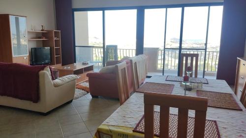 Posezení v ubytování Lovely 3-bedroom apartment with stunning views