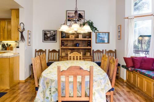 a kitchen and dining room with a table and chairs at Miller's Landing in Wawona