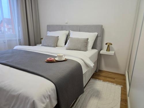 Postel nebo postele na pokoji v ubytování Apartment Bella