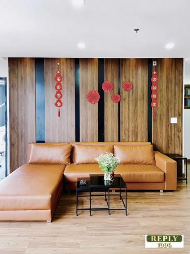 a living room with a couch and a table at Reply 1996 Apartment in DaLat Center in Da Lat