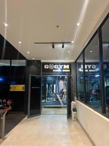 a store front with a glass door in a building at Reply 1996 Apartment in DaLat Center in Da Lat