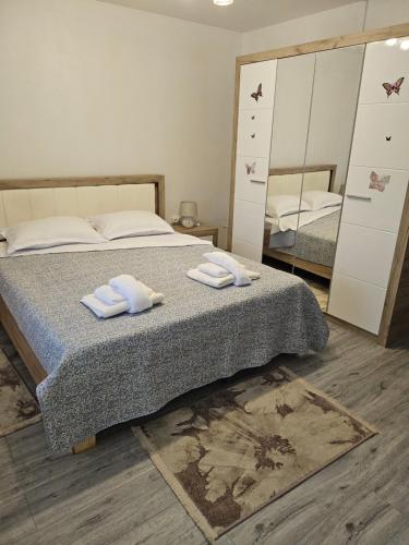 Ένα ή περισσότερα κρεβάτια σε δωμάτιο στο Vila Elena