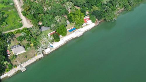 an aerial view of a bridge over a river at Los Veleros 2 in Ceiba Rica
