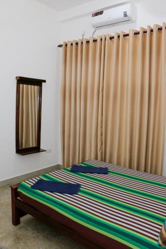 Postel nebo postele na pokoji v ubytování Cvilla Hotel