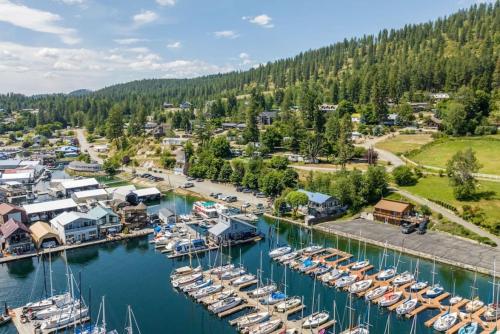 an aerial view of a marina with boats docked at Charming Waterfront Float Home with Panoramic Lake Views in Athol