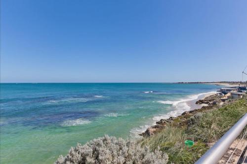 a view of a beach with the ocean at Endless Summer - The Reefs in Perth