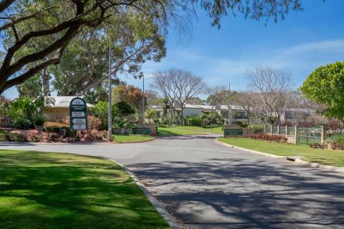 a street in a residential neighborhood with a house at A8 - Enjoy a romantic weekend at cozy studio apt in Perth