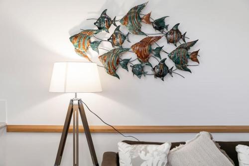 a wall with a fish decal on a wall at A6 - Work-from-home haven - free WIFI - 1BR in Perth