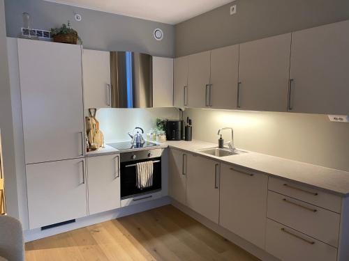 Dapur atau dapur kecil di Modern, big and central apartment in Trondheim