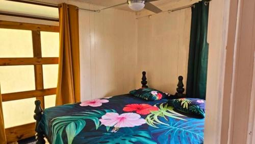 Postel nebo postele na pokoji v ubytování MOOREA - Fare Nihei